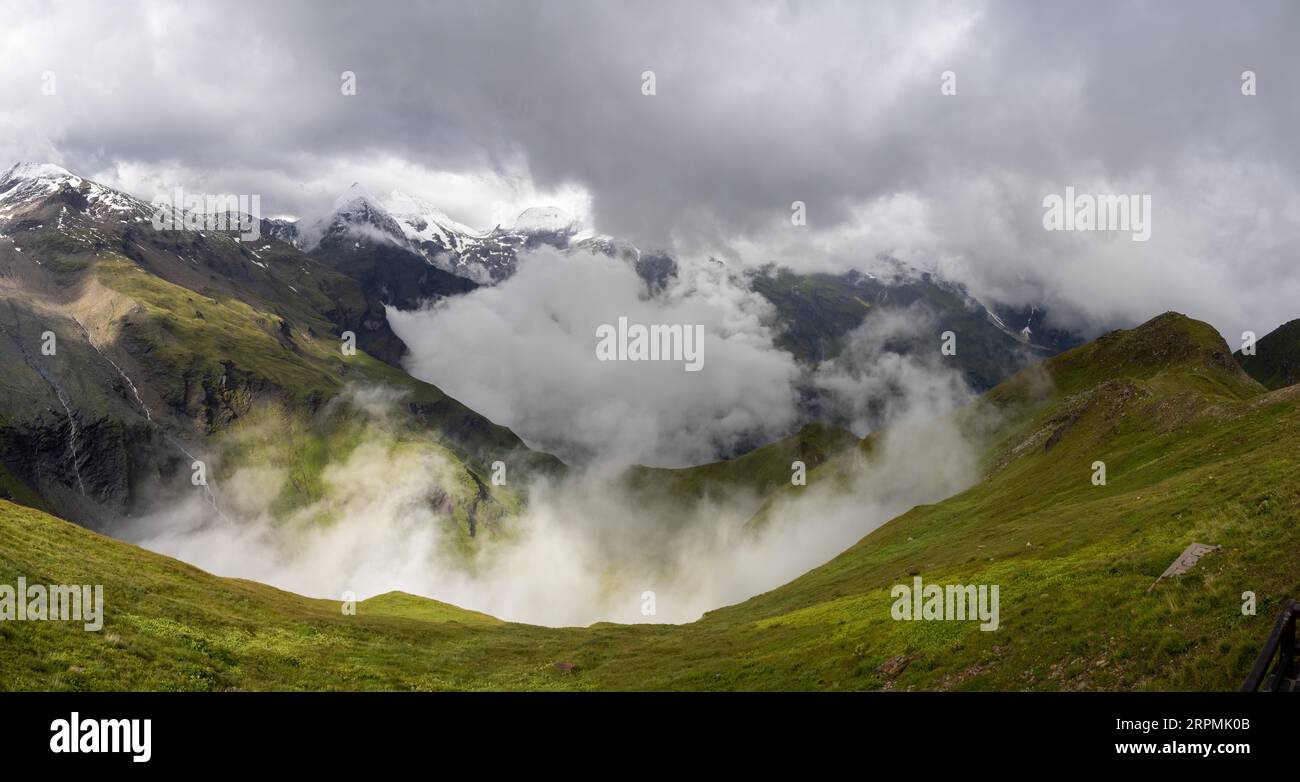 Alpine peaks, morning mist drifting over a mountain ridge, view from ...