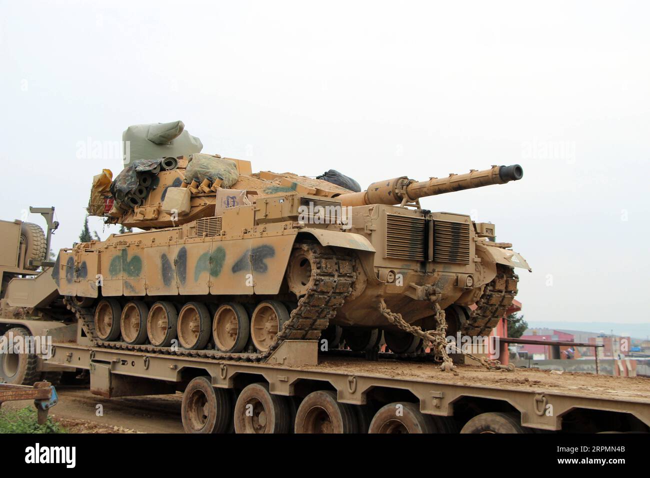 200214 -- ANKARA, Feb. 14, 2020 Xinhua -- A Turkish tank is seen in Reyhanli district of Hatay, Turkey, on Feb. 14, 2020. Turkey has poured in the last few days thousands of troops and convoys of military vehicles across the border, including tanks, armored personnel carriers and radar equipment in order to bolster its 12 observation posts. Photo by Mustafa Kaya/Xinhua TURKEY-HATAY-SYRIAN BORDER-MILITARY PRESENCE-INCREASING PUBLICATIONxNOTxINxCHN Stock Photo
