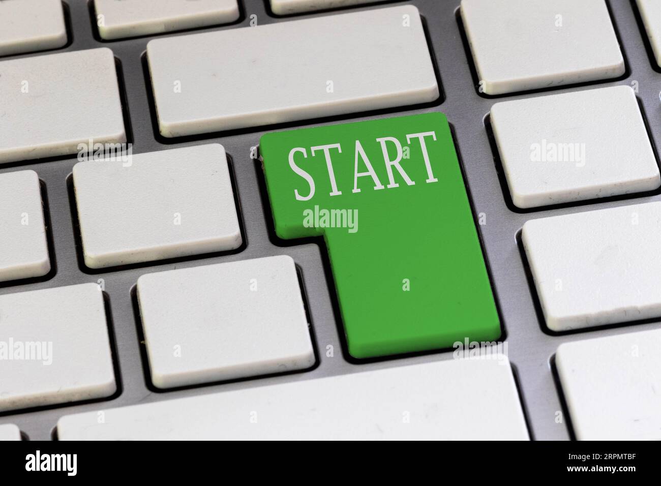 A Green key on a computer keyboard reading START in capital letters Stock  Photo - Alamy