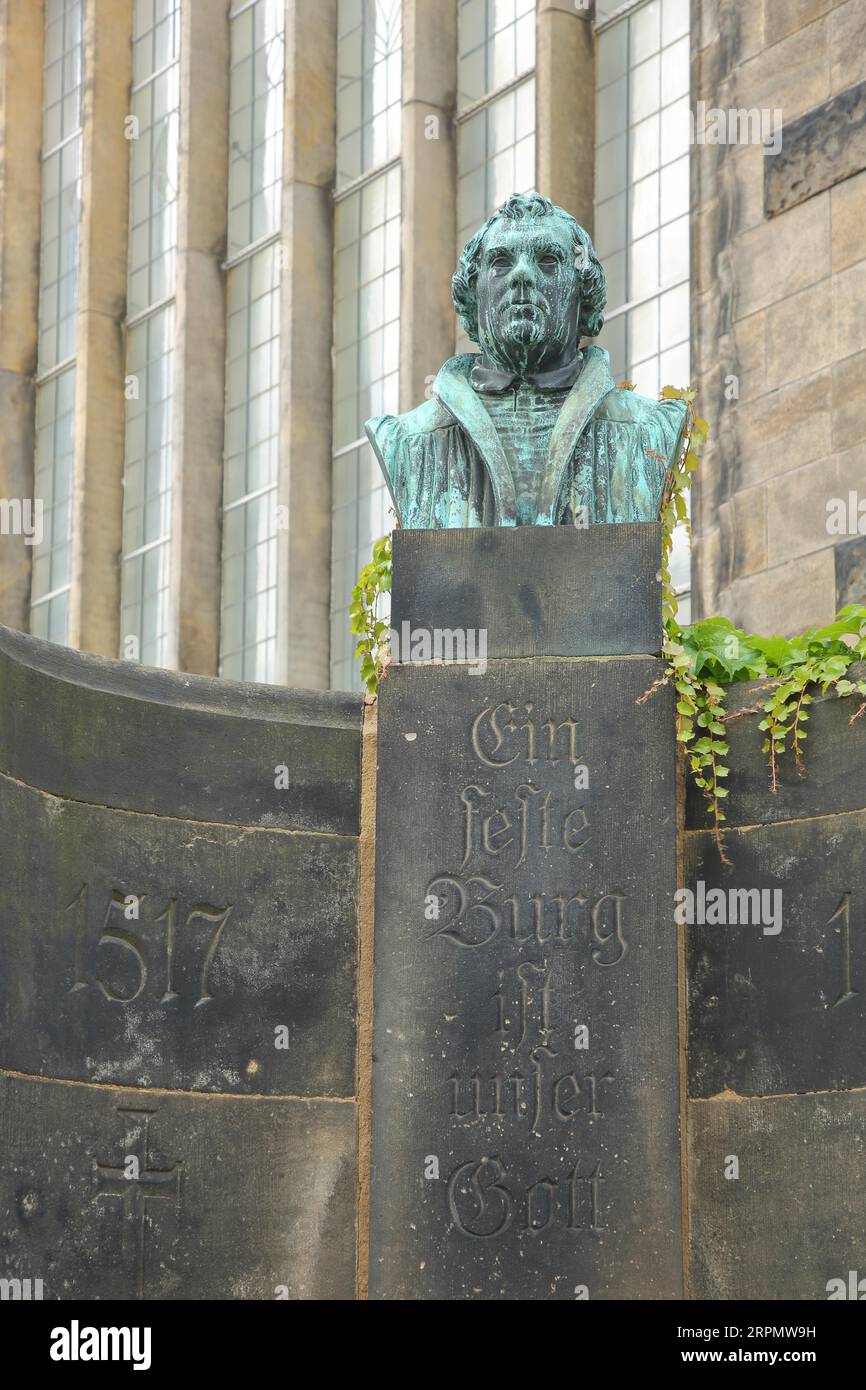Martin Luther Fountain with Inscription A Mighty Fortress is Our God and the Year 1517 at the Cathedral, Quote, Saying, Chant, Text, Freiberg Stock Photo