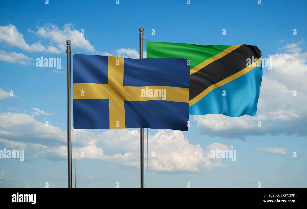 Tanzania and Sweden flag waving together in the wind on blue sky, two ...