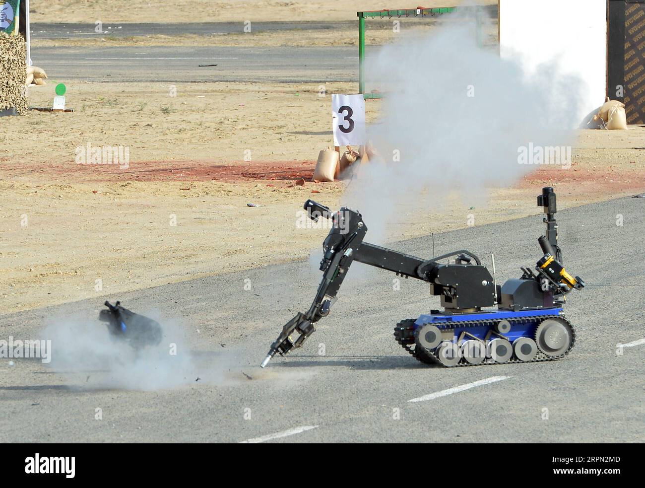 200220 -- JAHRA GOVERNORATE, Feb. 20, 2020 -- A robot deals with a suspicious package during an exercise of Kuwait National Guard KNG in Jahra Governorate, Kuwait, Feb. 20, 2020. The KNG held on Thursday a field exercise in Jahra Governorate. The exercise aims to respond to possible terrorist and violent emergencies. Photo by Asad/Xinhua KUWAIT-JAHRA GOVERNORATE-NATIONAL GUARD-EXERCISES NiexYunpeng PUBLICATIONxNOTxINxCHN Stock Photo