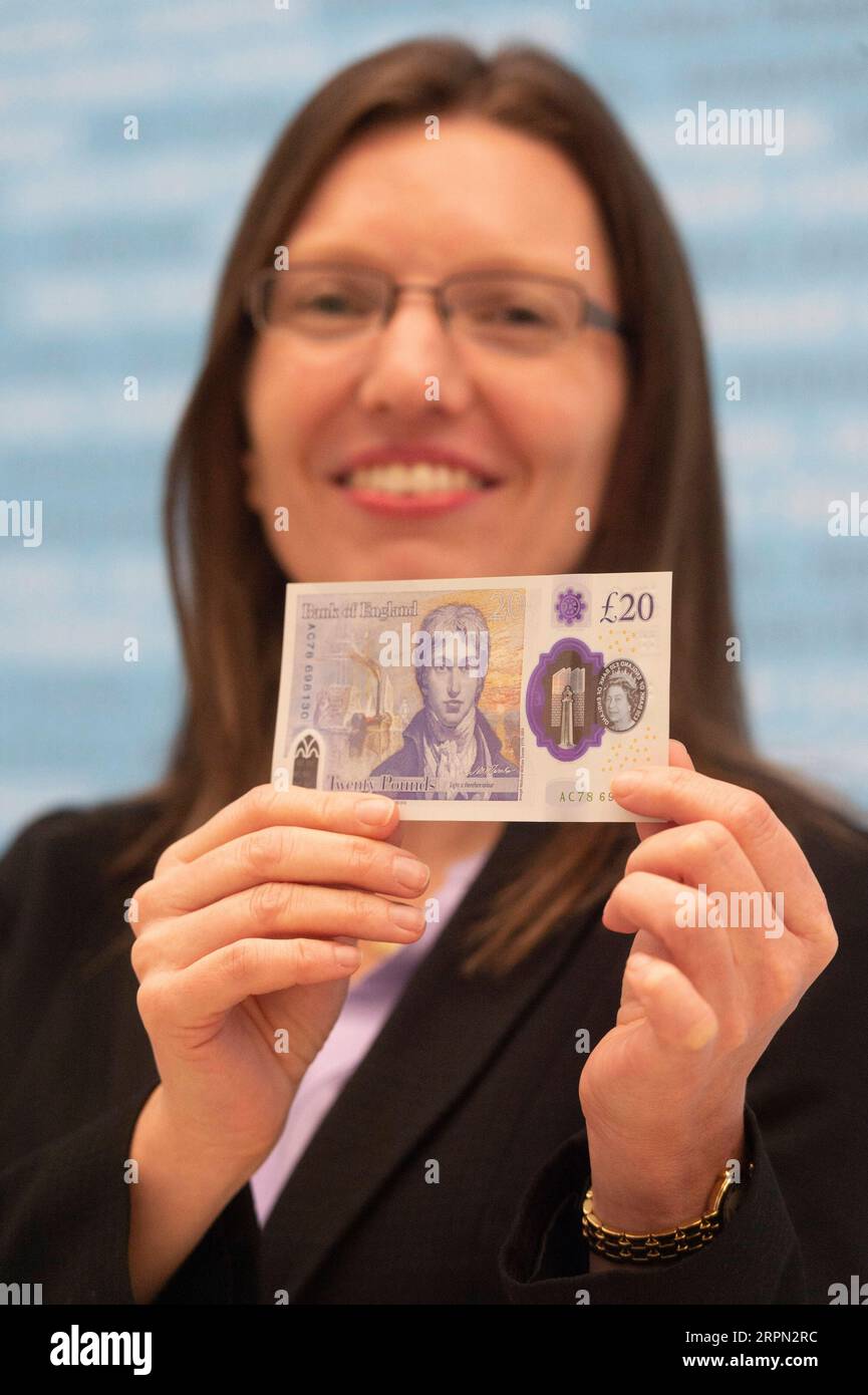200220 -- LONDON, Feb. 20, 2020 Xinhua -- Bank of England Chief Cashier Sarah John poses for photographs with the new 20 pound note at Tate Britain in London, Britain, on Feb. 20, 2020. Deemed as the most secure ever note issued by the Bank of England, the latest 20 pound note has gone into circulation Thursday. The new polymer note features the famous English watercolor artist Joseph Mallord William Turner. Photo by Ray Tang/Xinhua BRITAIN-LONDON-LAUNCH-NEW 20 POUND NOTE PUBLICATIONxNOTxINxCHN Stock Photo