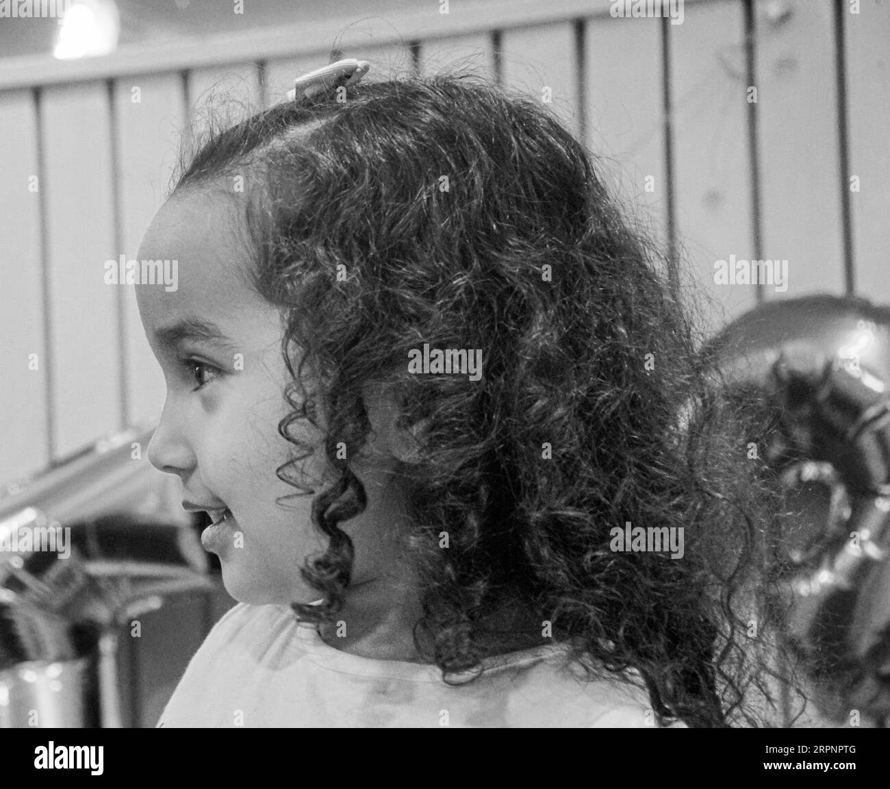 Happy girl long curly Black and White Stock Photos & Images - Alamy