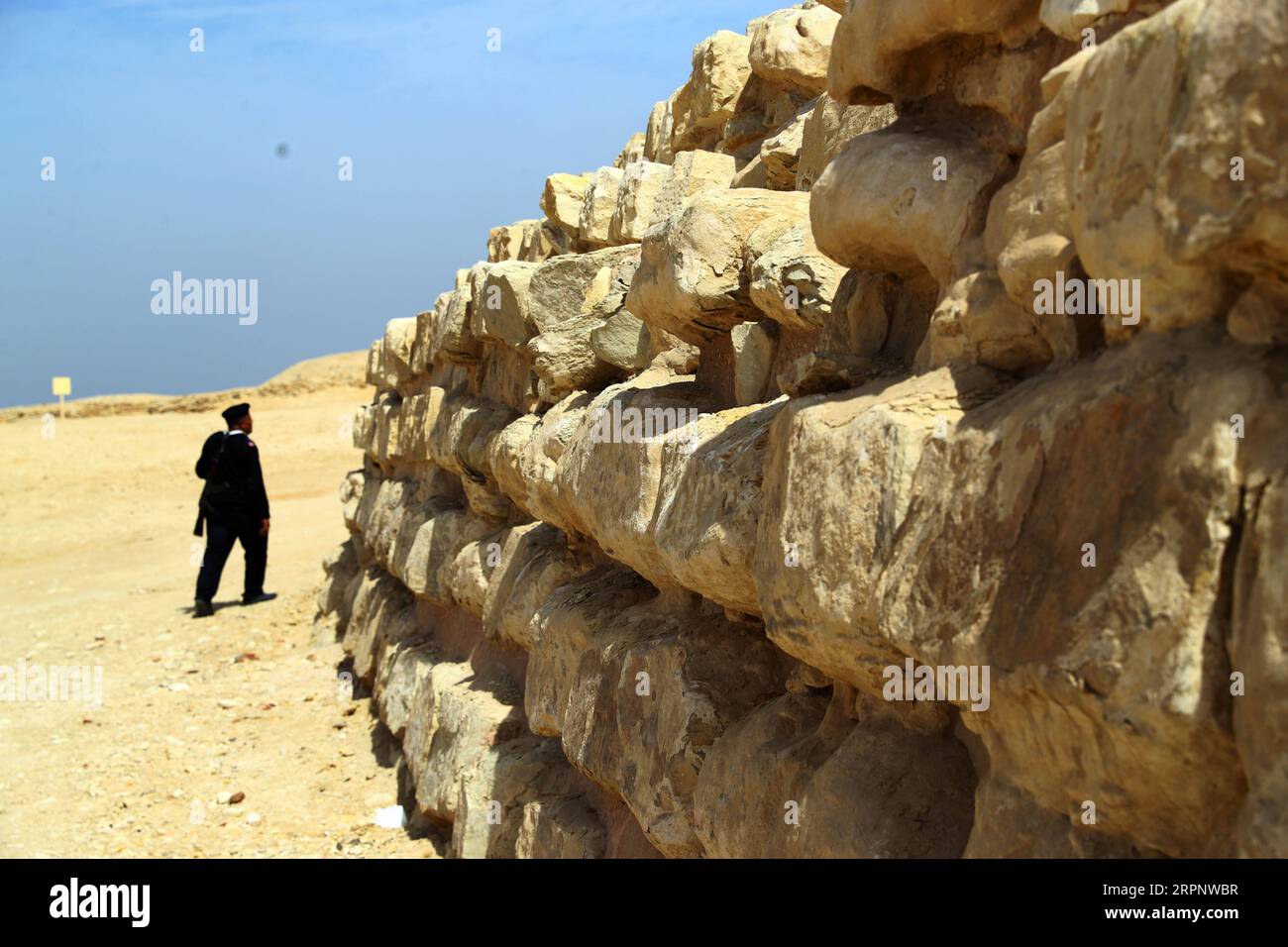 Mostafa Fathi Pyramids 200305 -- GIZA, March 5, 2020 Xinhua -- A policeman is seen near the ...