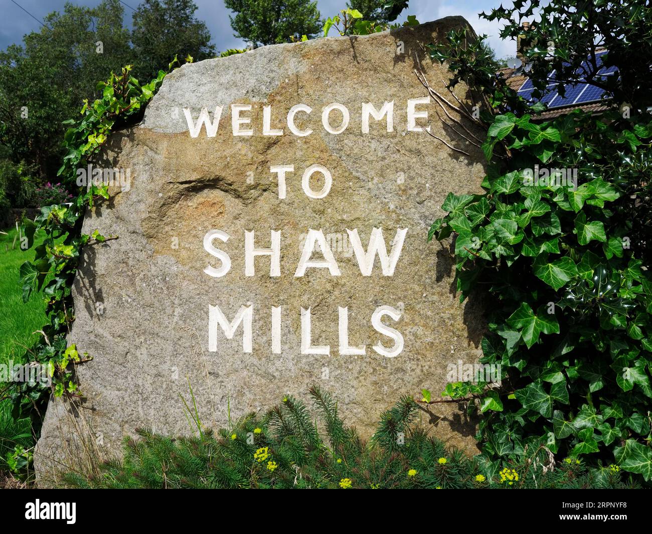 Welcome to Shaw Mills Sign entering the village on the Nidderdale Way Shaw Mills Nidderdale North Yorkshire England Stock Photo