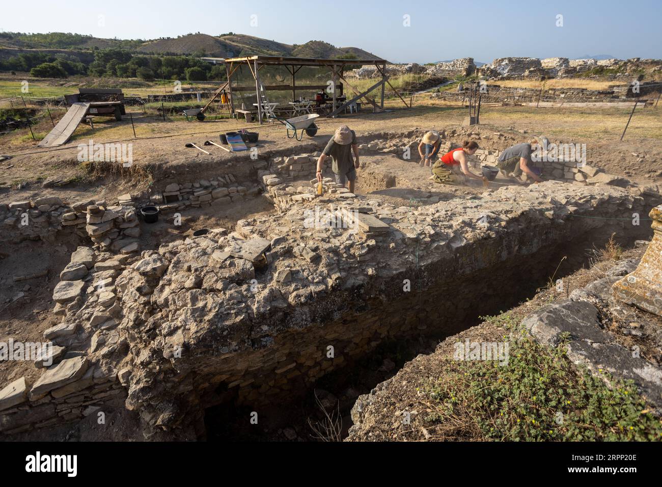 Gradsko, Stobi, North Macedonia - July 20, 2023: Archaeologists excavate at the archaeological site Stobi. Stock Photo