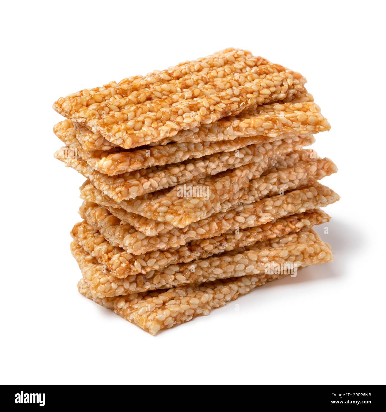 Pile of sesame snaps isolated on white background close up Stock Photo