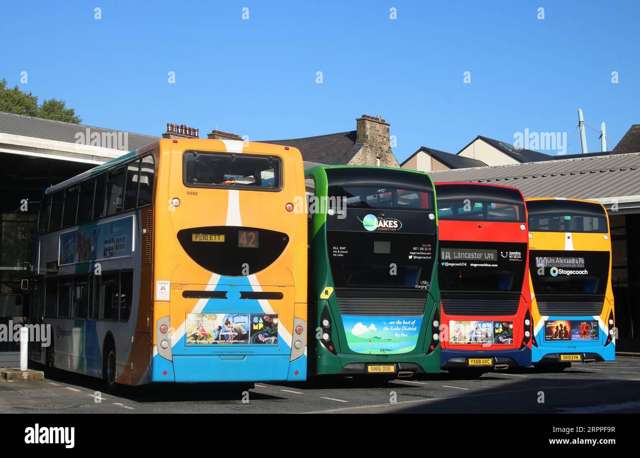 Four Stagecoach double deck buses in three different liveries waiting to start their services from Lancaster bus station on 5th September 2023. Stock Photo