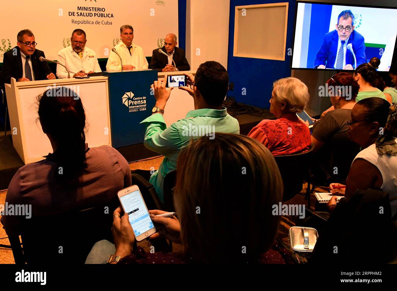 200318 -- HAVANA, March 18, 2020 Xinhua -- Cuban officials from Ministry of Foreign Affairs and Ministry of Public Health attend a press conference on the cruise ship MS Braemar and the COVID-19 in Havana, Cuba, March 17, 2020. A cruise ship carrying five British passengers who tested positive for COVID-19 has reached Cuban territorial waters, Jose Antonio Fernandez, deputy head of communications at the Ministry of Foreign Affairs, said on Tuesday. The affected passengers are to be flown back to their country on four charter flights operated by British Airlines. Cuba agreed to a request by the Stock Photo