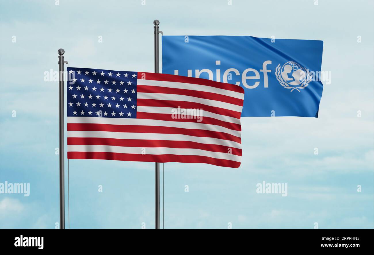 UNICEF and USA flag waving together in the wind on blue sky Stock Photo ...