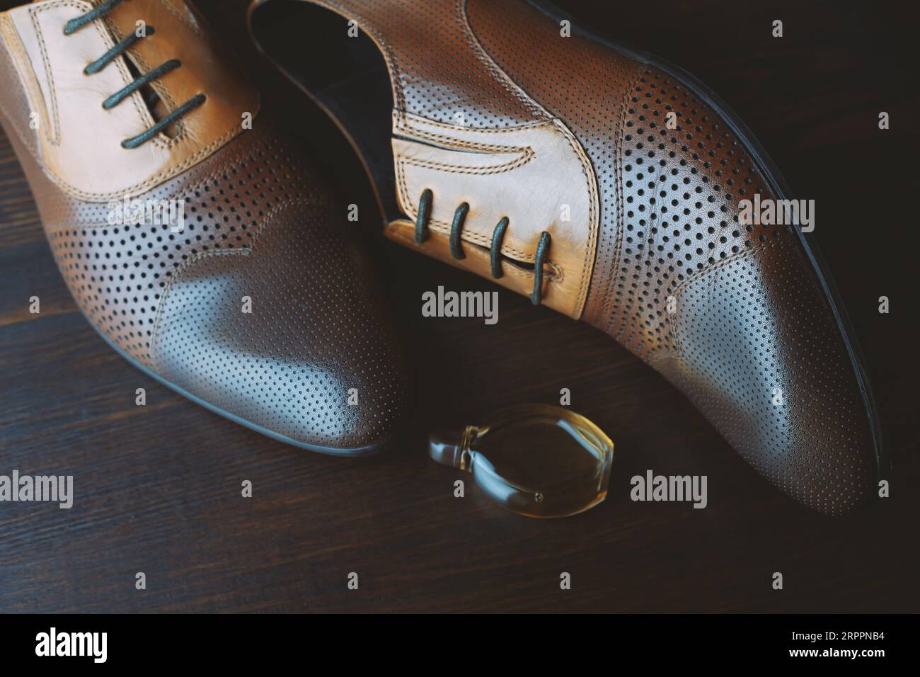 Men shoes on brown wooden background Stock Photo
