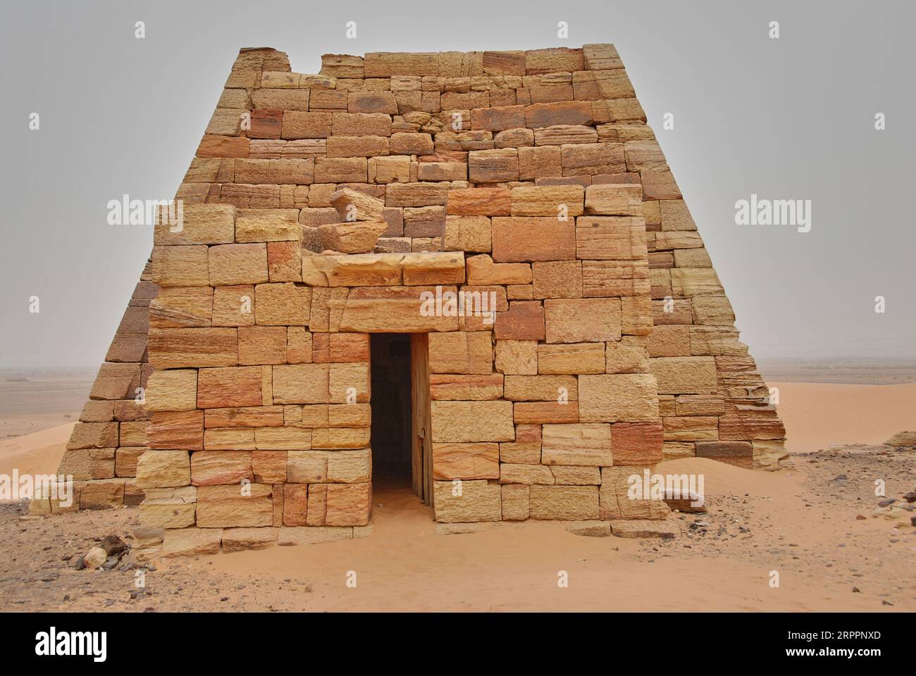 Meroe, Sudan - 05 29 2011: ancient historic archeological site of Meroe Pyramids in the dry and arid desert region of the Sahara in Sudan along the ri Stock Photo