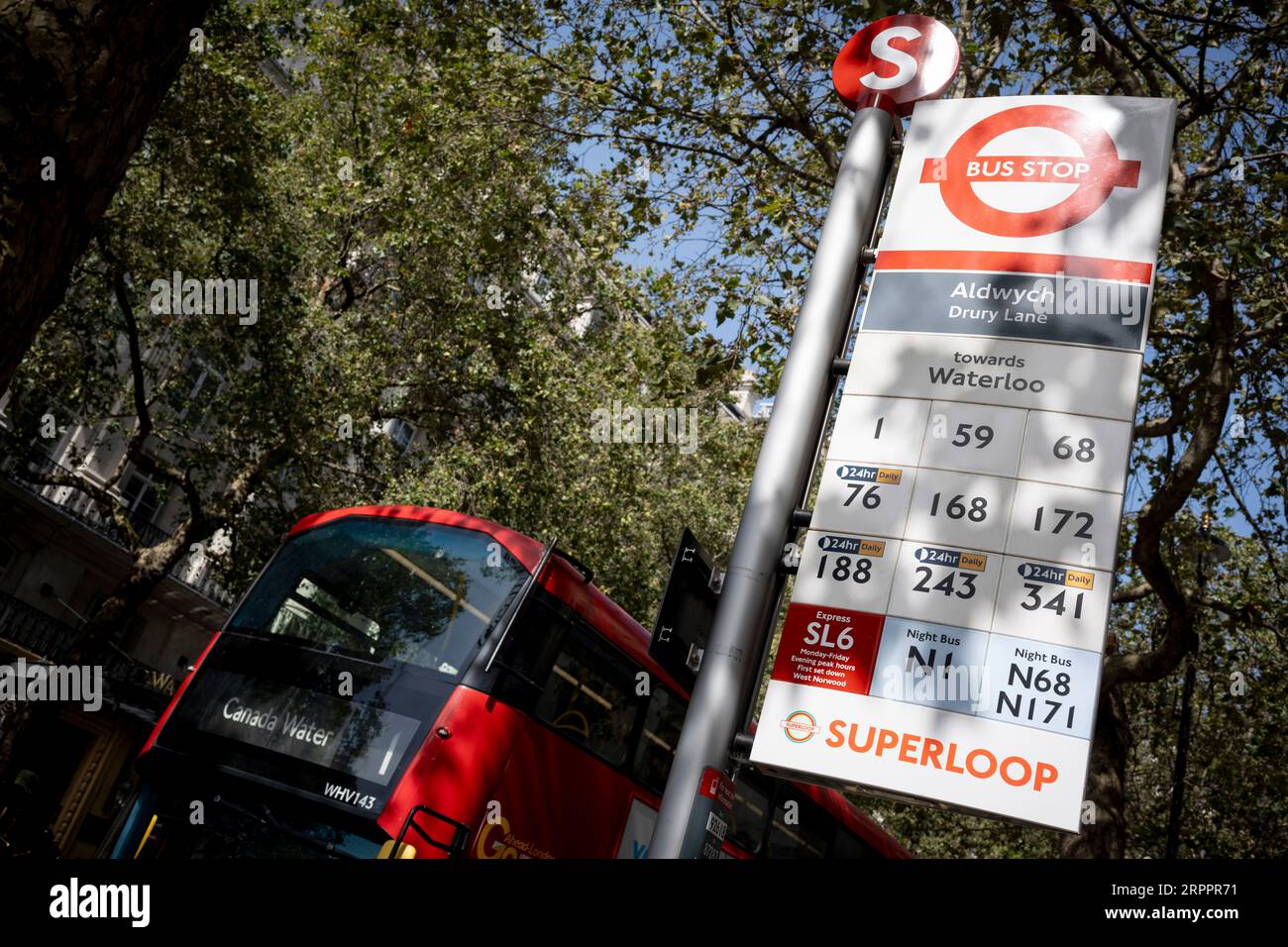 Bus numbers and times, including the new Superloop routes around the capital, are seen at a bus stop at Aldwych in the West End, on 5th September 2023, in London, England. Stock Photo