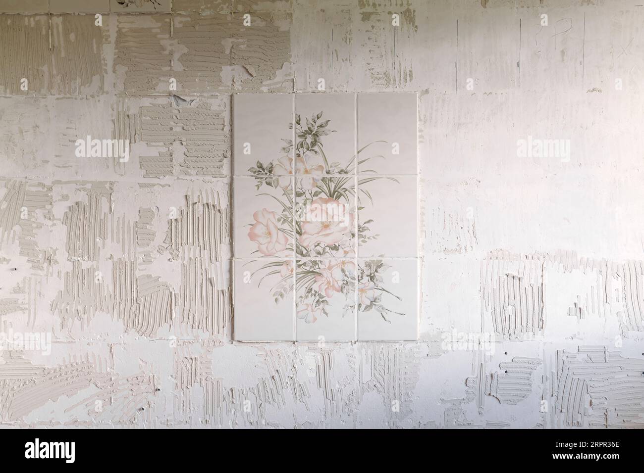 Removing ceramic tiles from a bathroom wall during home improvement