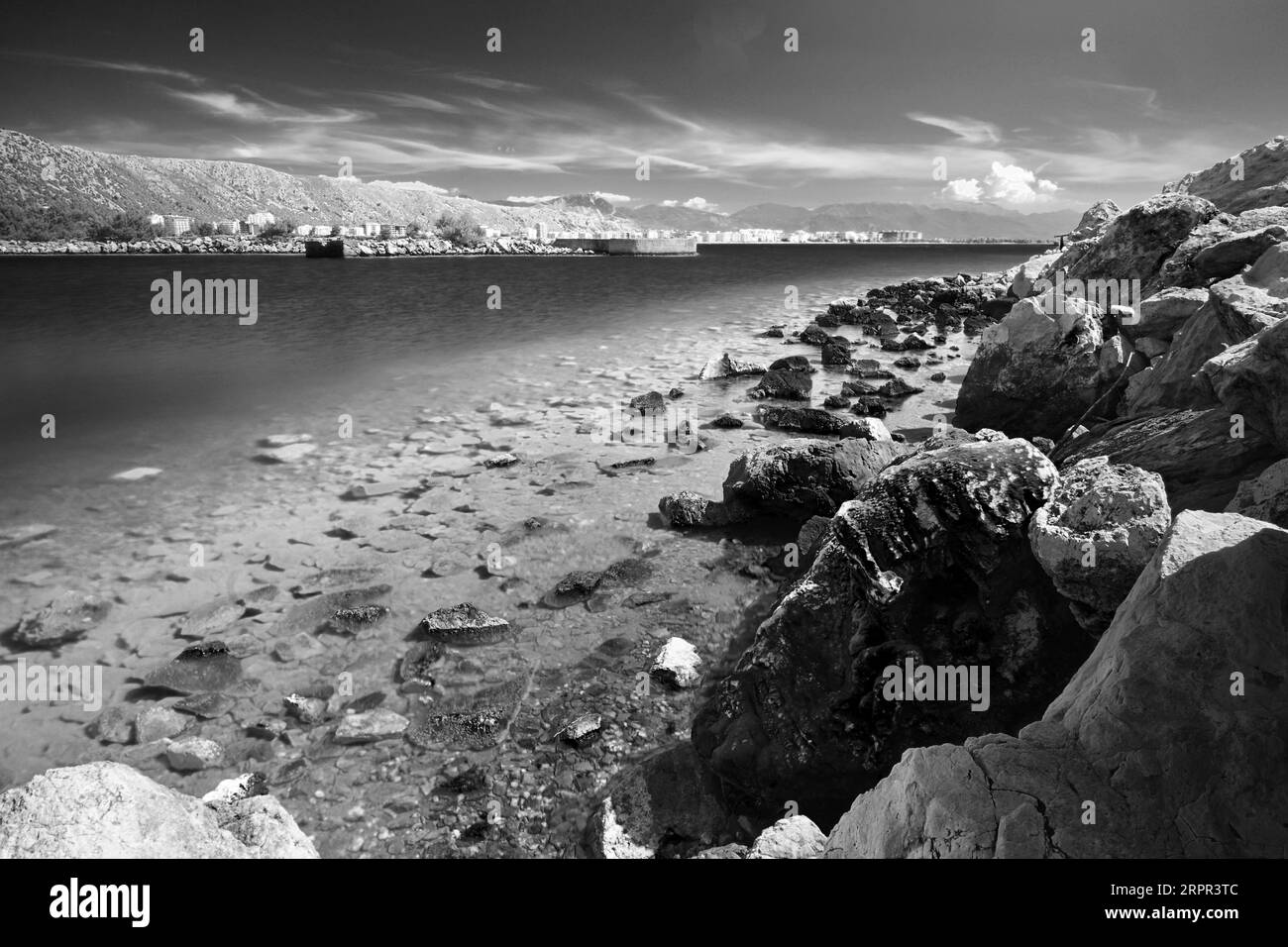 Rocky coastline, natural seashore background in black and white Stock ...