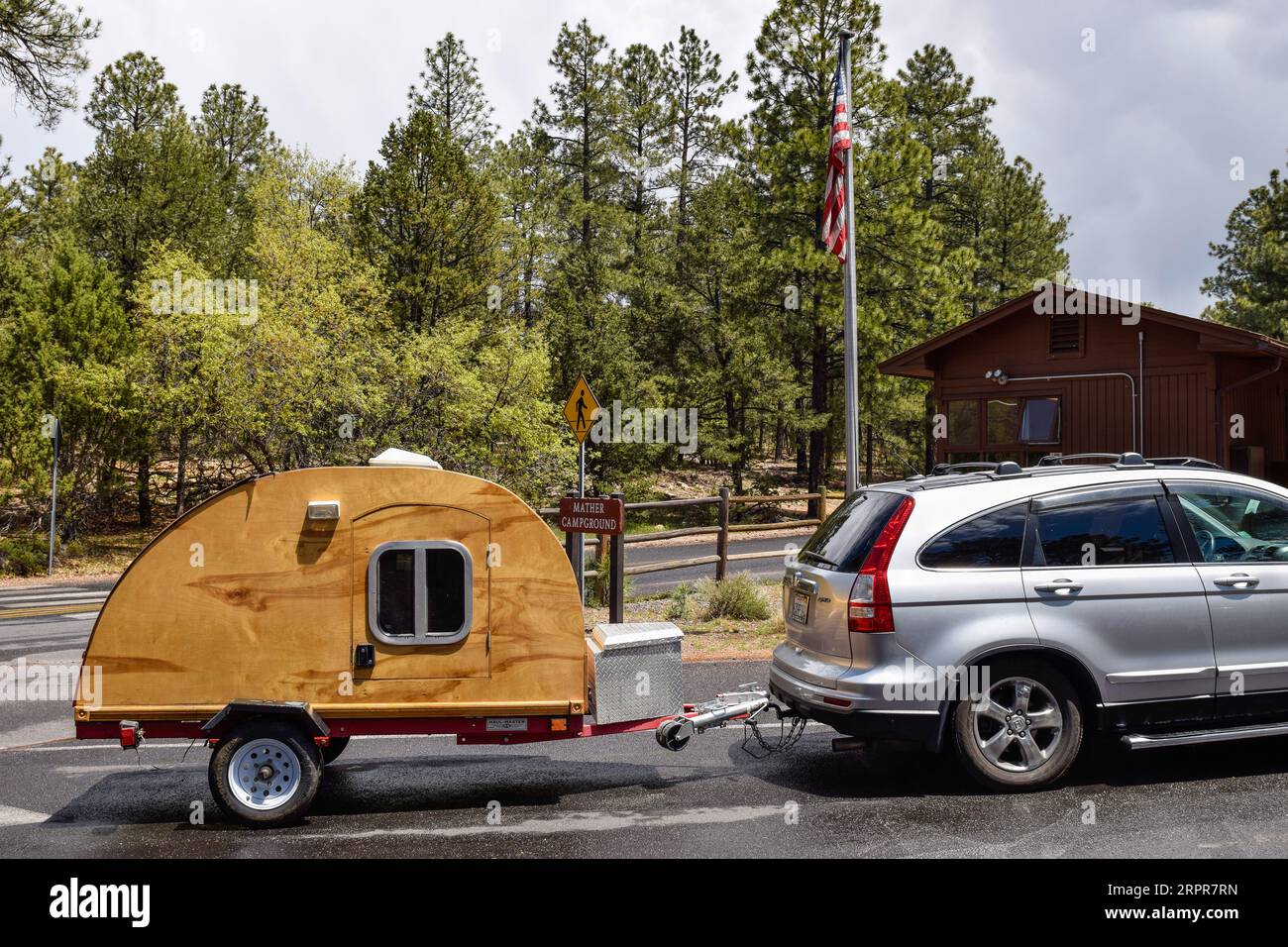 GRAND CANYON NATIONAL PARK, USA - MAY 29, 2015: Self-made teardrop camping trailer at a Grand Canyon campground. Camping is a popular way to visit thi Stock Photo