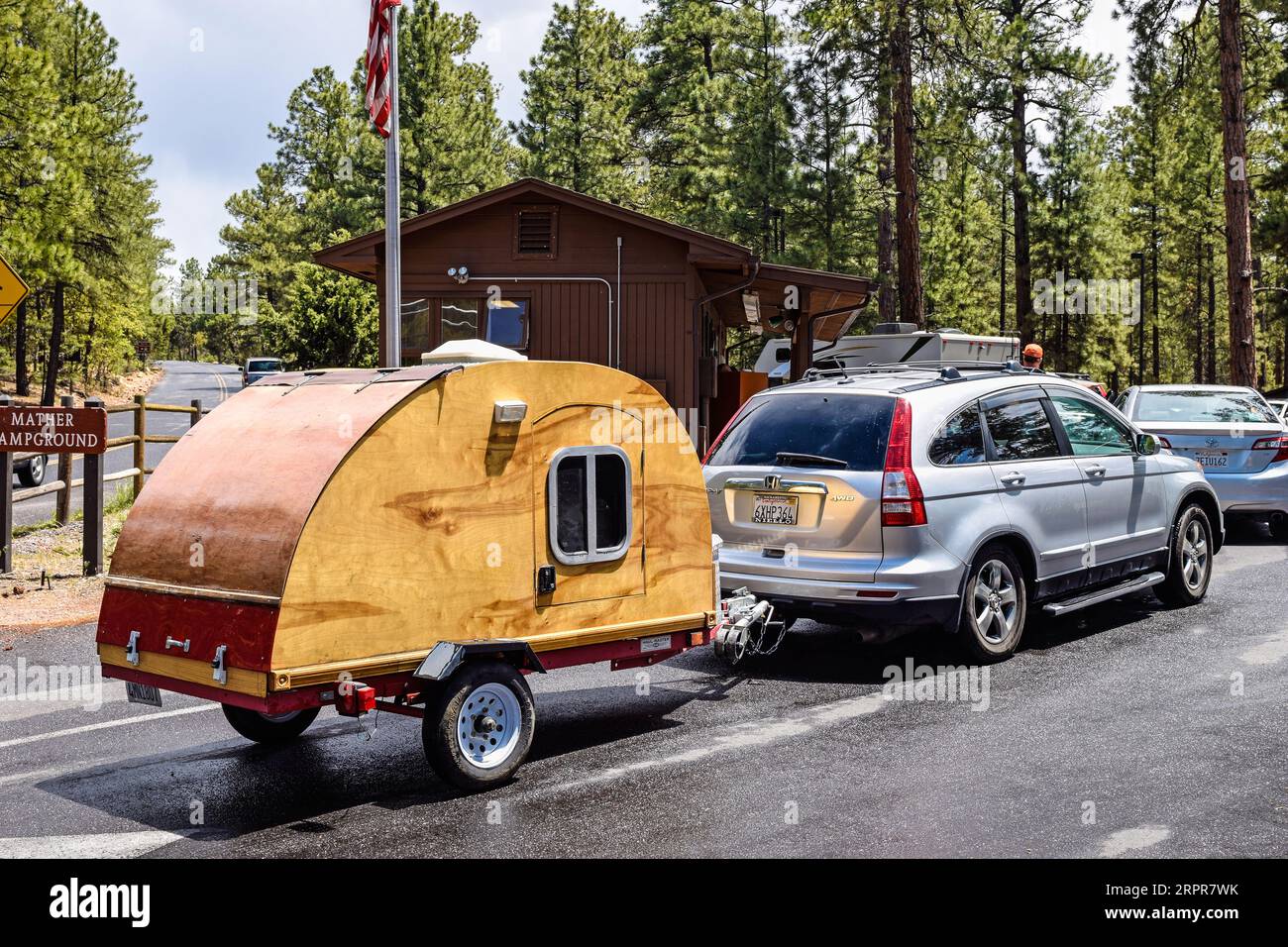 GRAND CANYON NATIONAL PARK, USA - MAY 29, 2015: Self-made teardrop camping trailer at a Grand Canyon campground. Camping is a popular way to visit thi Stock Photo