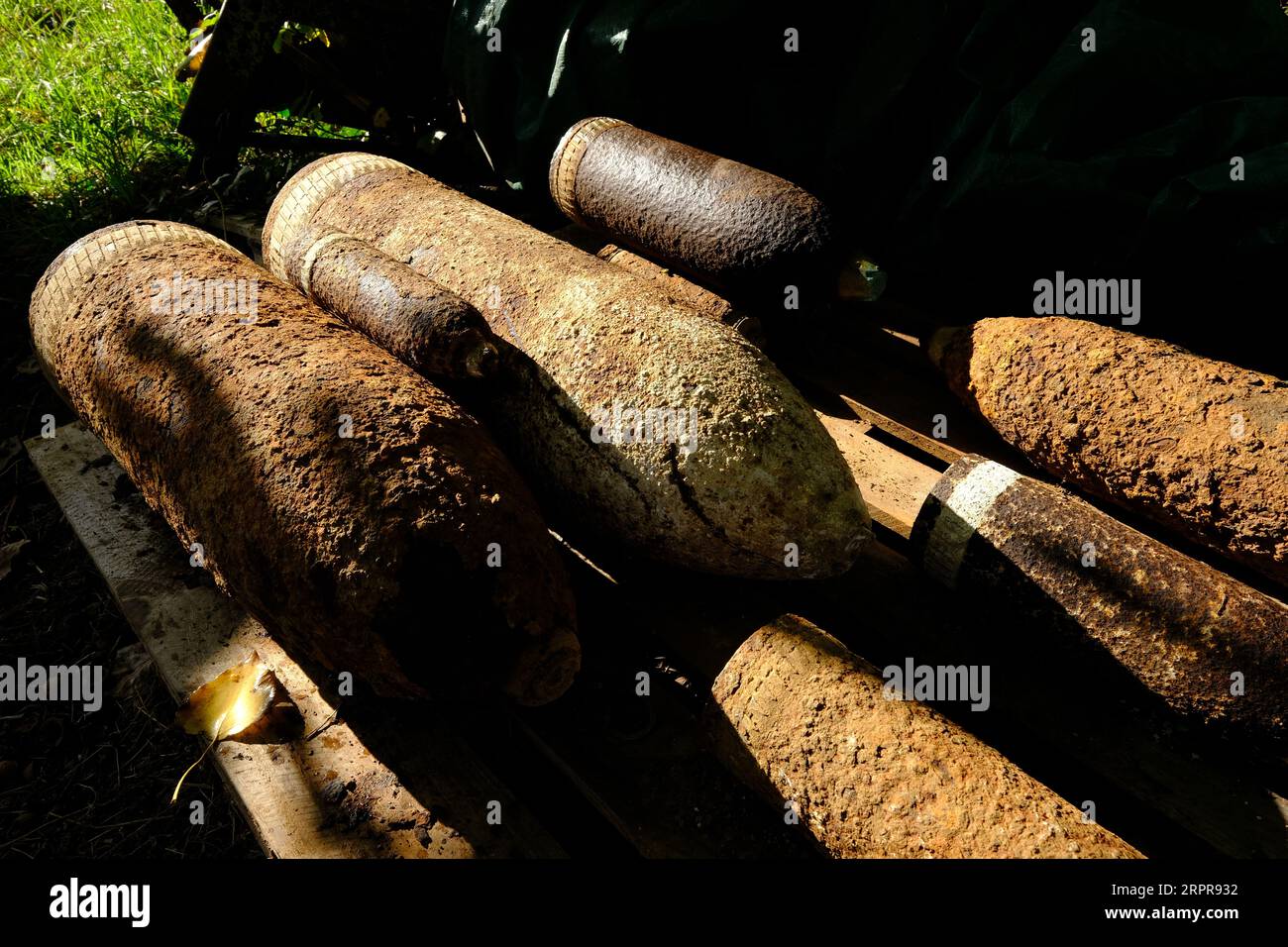 Unexploded First World War shells stacked for collection from French farm in the Somme region Stock Photo