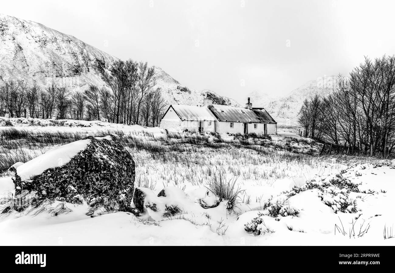 Black Rock Cottage, Glencoe after a heavy snowfall Stock Photo