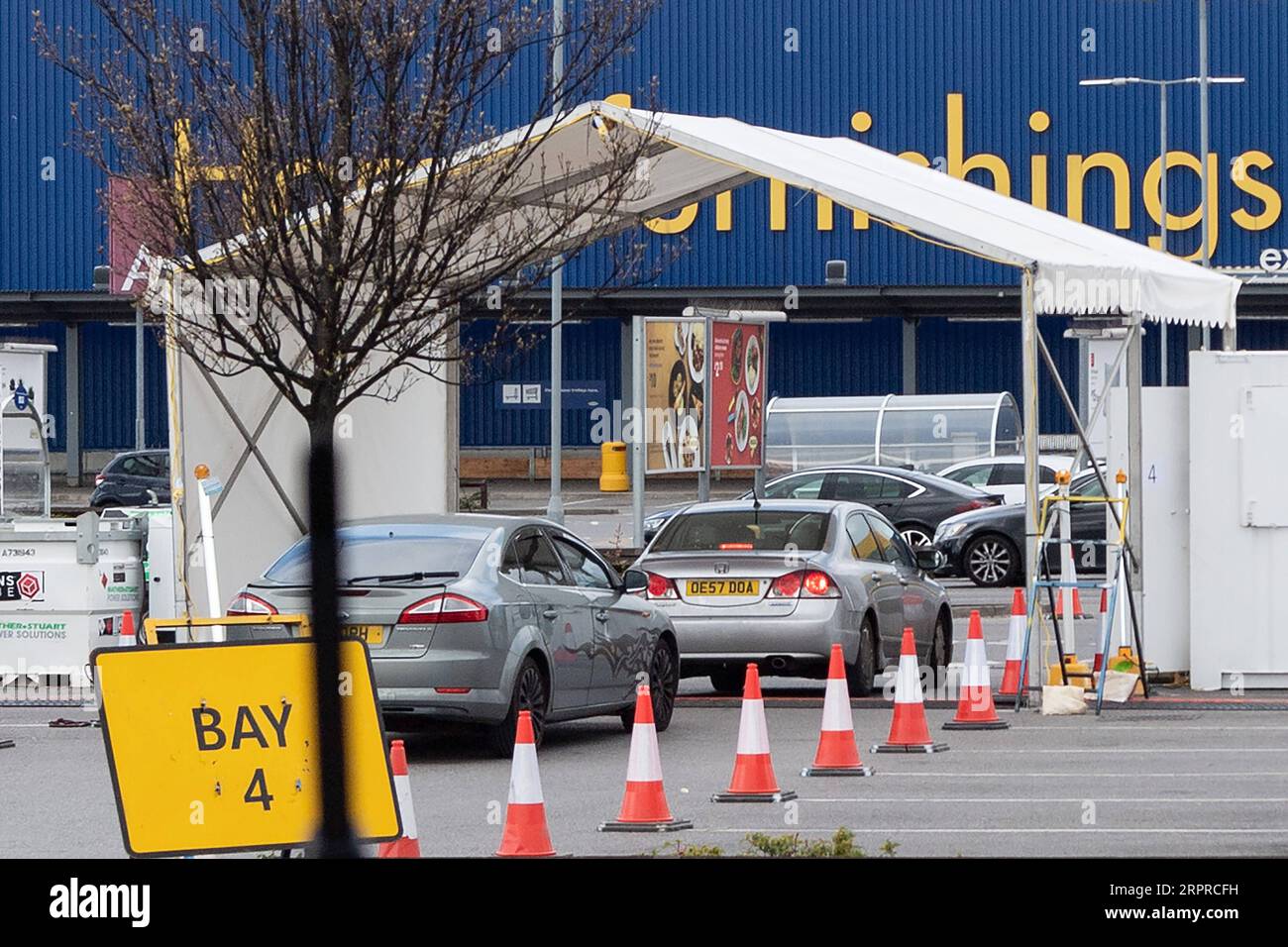 200401 -- LONDON, April 1, 2020 Xinhua -- Photo taken on March 31, 2020 shows a drive-through COVID-19 test station set up in the parking lot of an IKEA store in Wembley, northwest London, Britain. According to local media, a COVID-19 test centre for National Health Service NHS staff workers has opened at the parking lot of an IKEA store in Wembley. Photo by Ray Tang/Xinhua BRITAIN-LONDON-COVID-19-TEST CENTRE-NHS STAFF PUBLICATIONxNOTxINxCHN Stock Photo