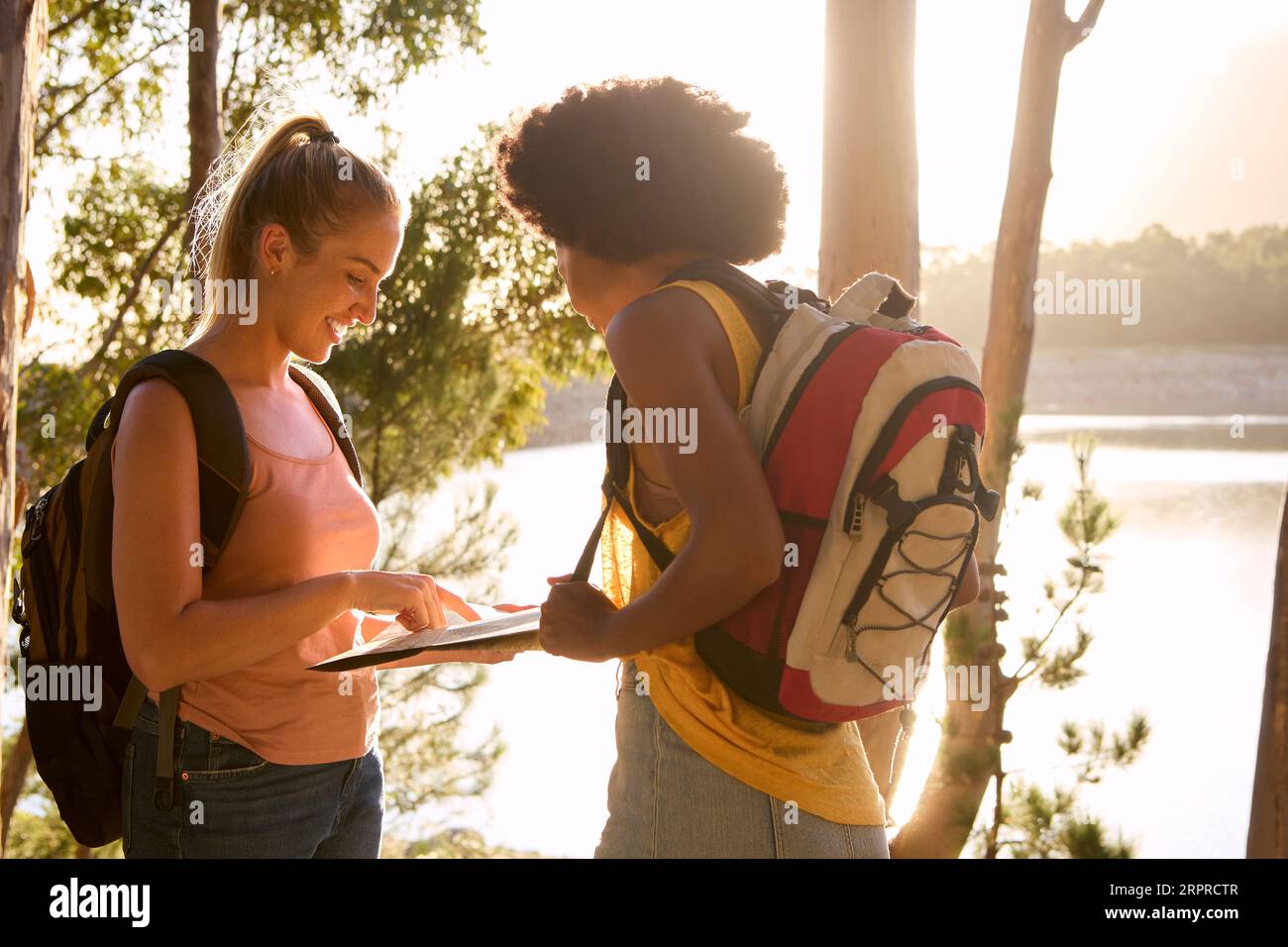 Two friends hiking map hi-res stock photography and images - Alamy