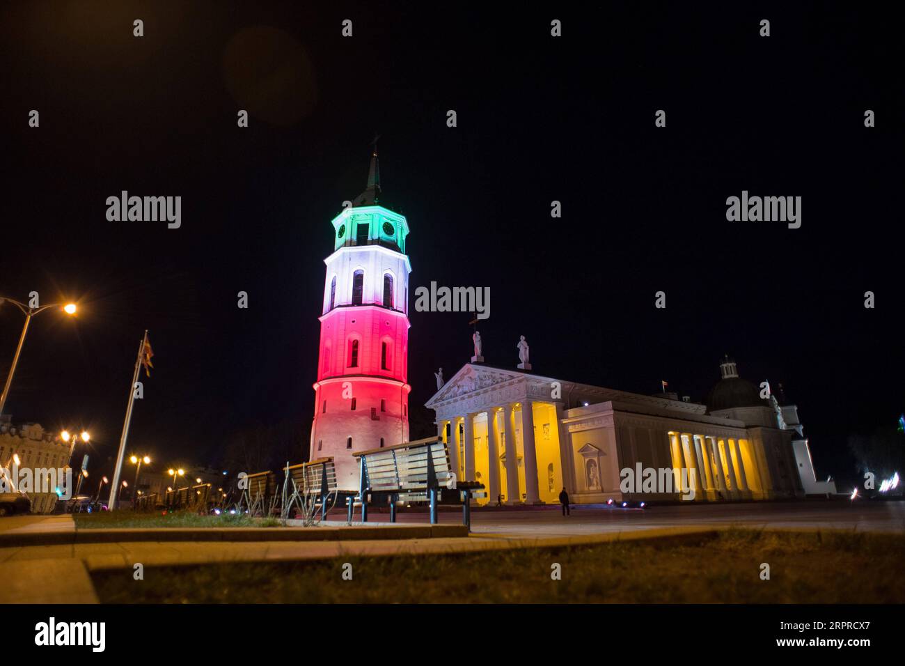 200401 -- VILNIUS, April 1, 2020 Xinhua -- The Vilnius Cathedral Bell Tower is illuminated in colors of the Italian national flag in sign of solidarity in Vilnius, Lithuania, March 31, 2020. Photo by Alfredas Pliadis/Xinhua LITHUANIA-VILNIUS-ITALY-SUPPORT PUBLICATIONxNOTxINxCHN Stock Photo