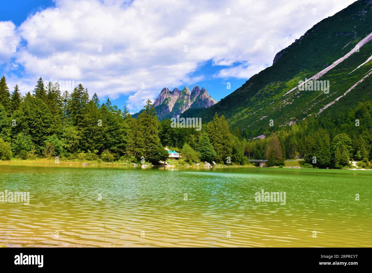 Cinque Punte mountain peaks at Lago del Predil near Tarvisio in Italy Stock Photo
