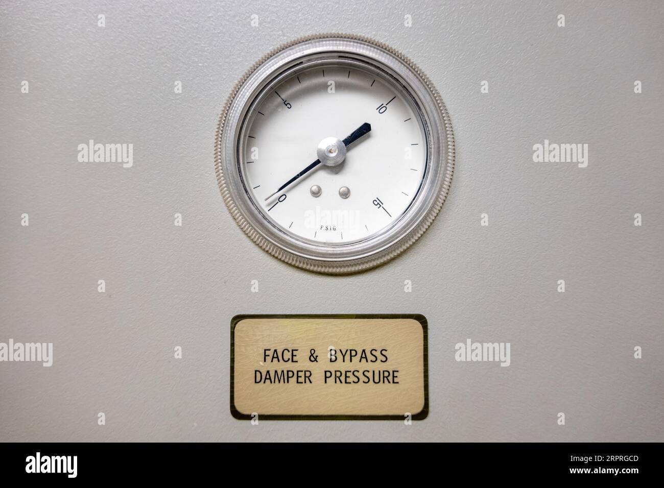Face and Bypass Discharge Pressure dial part of an old building HVAC