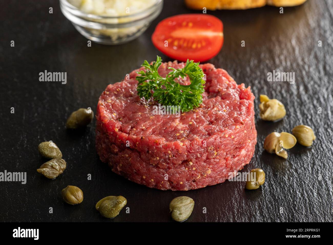 steak tartare on black slate Stock Photo