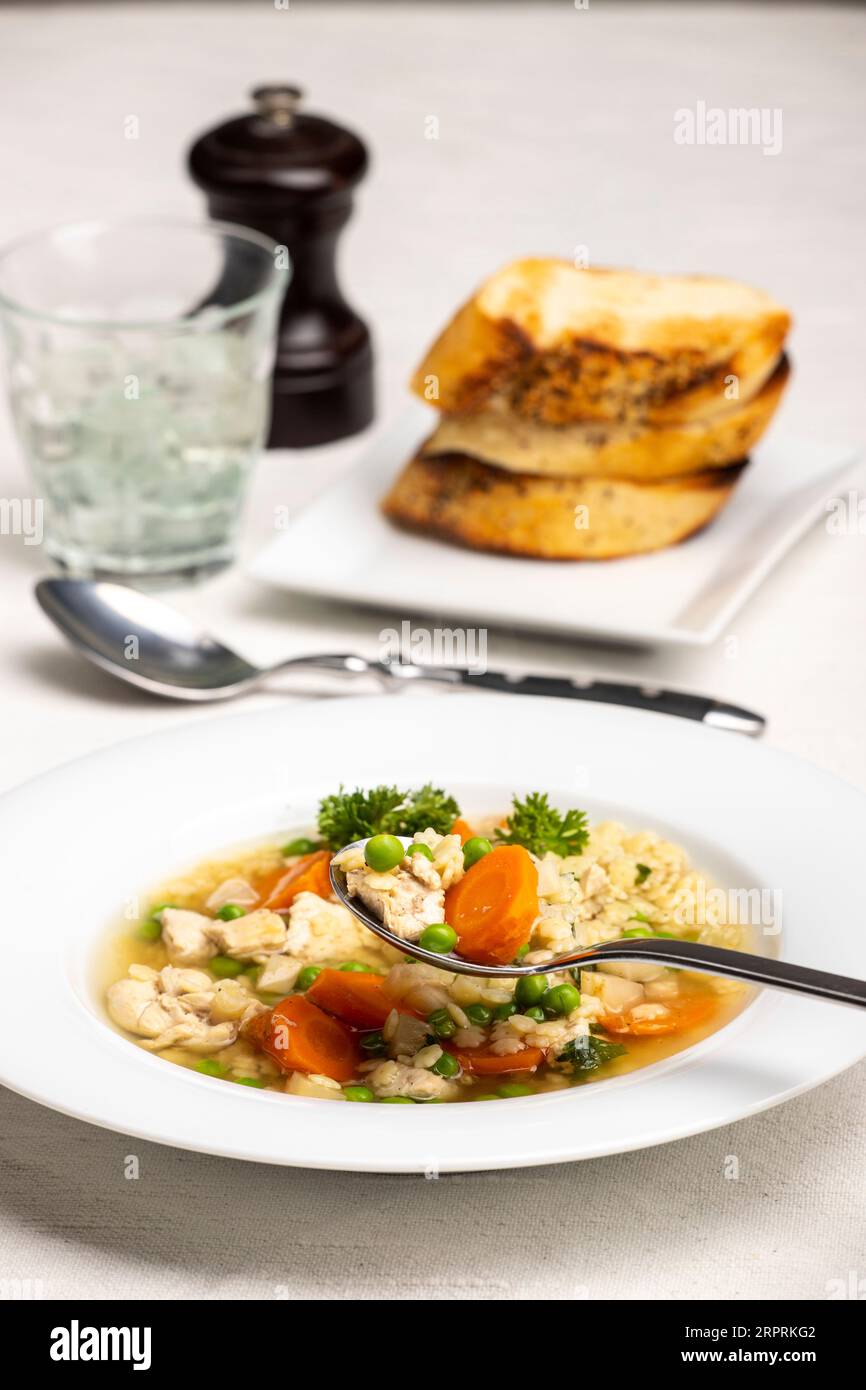 overview of chicken soup with bread Stock Photo