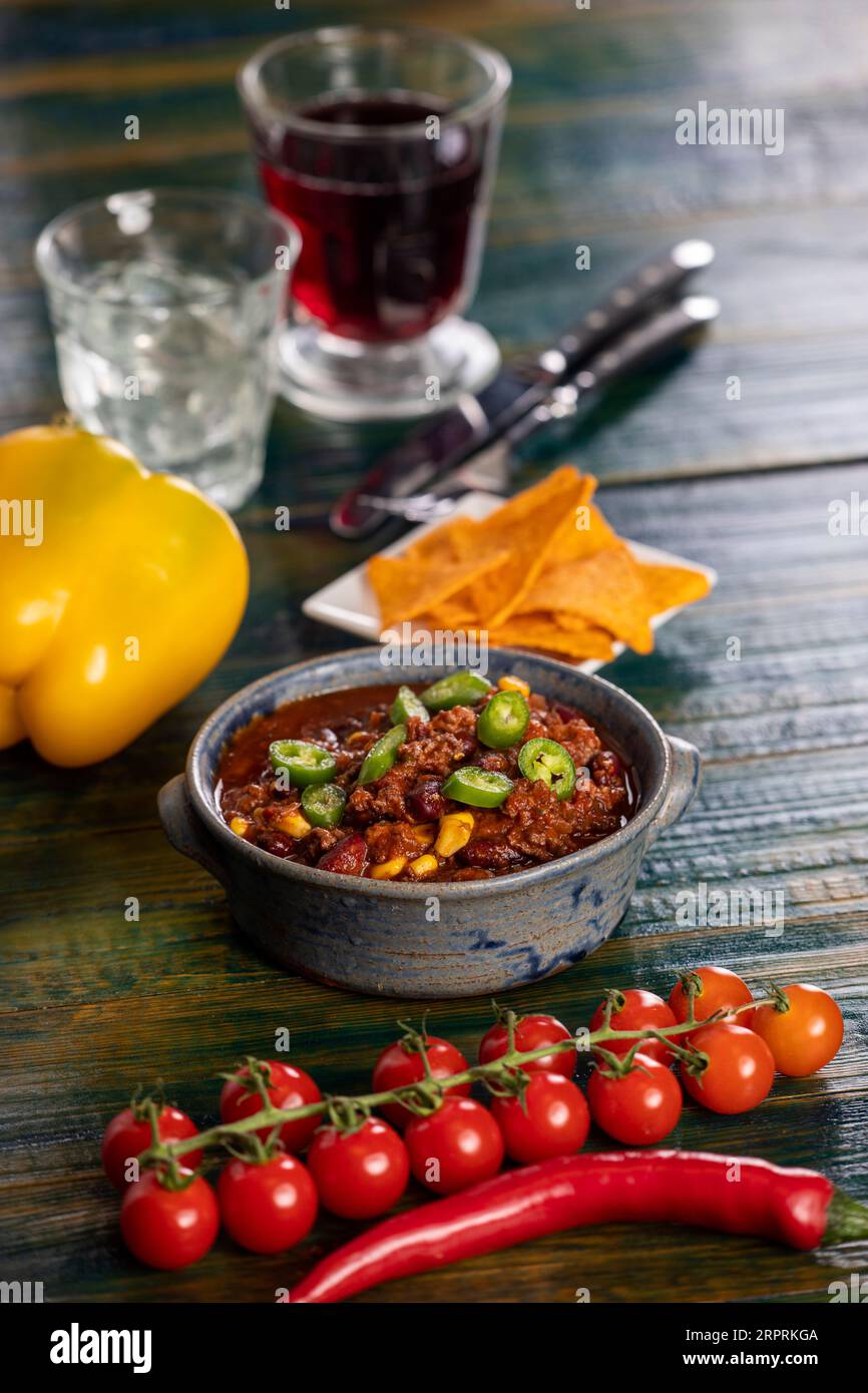 chili con carne with nachos Stock Photo