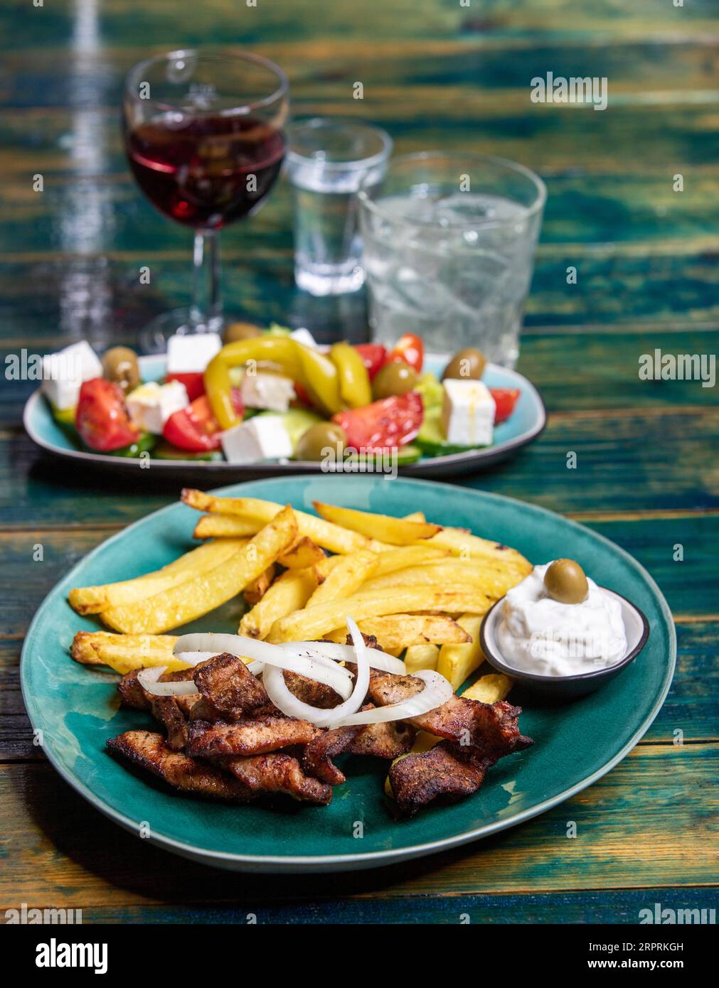 greek gyros with french fries and tzaziki Stock Photo