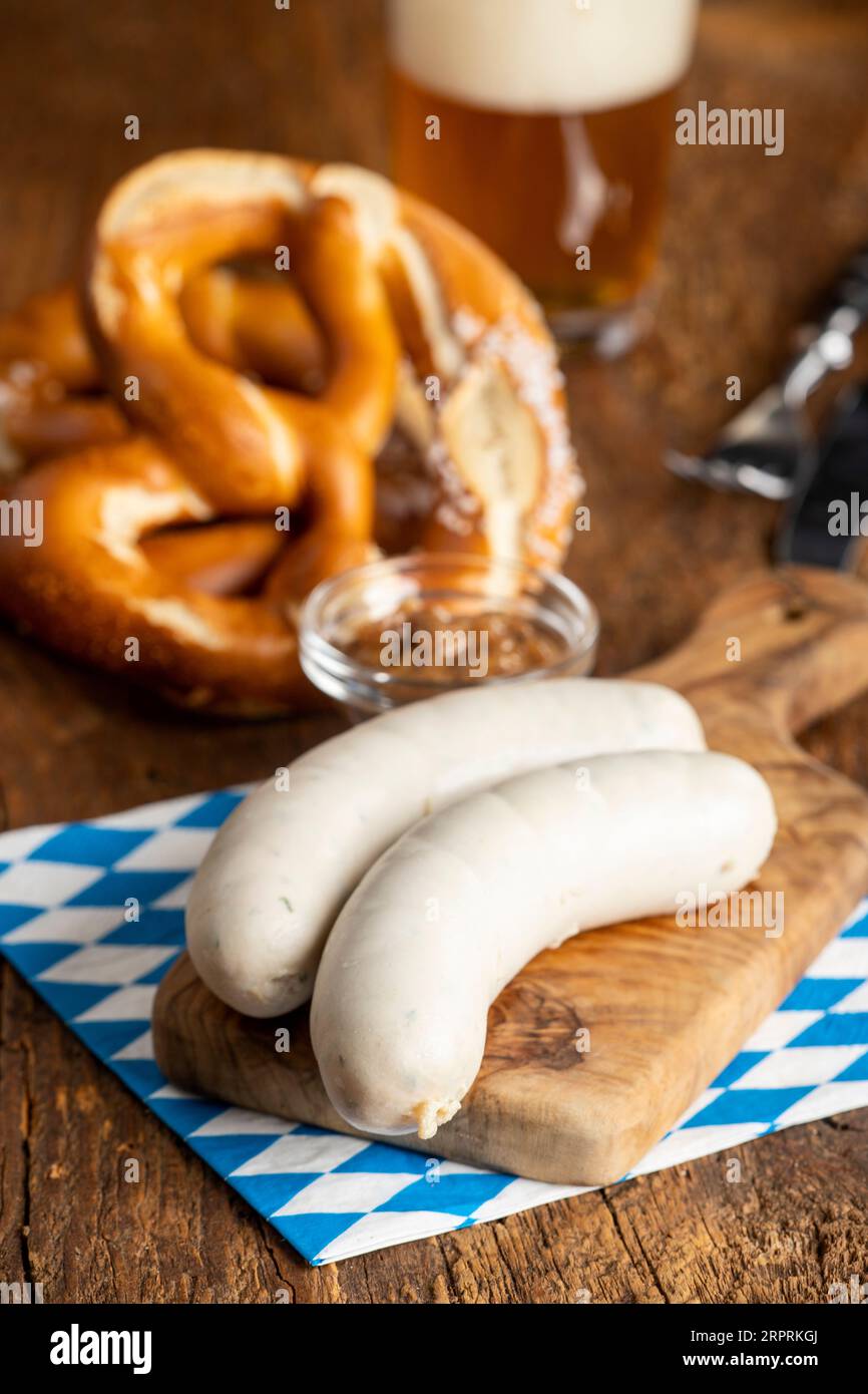 two bavarian white sausages on wood Stock Photo