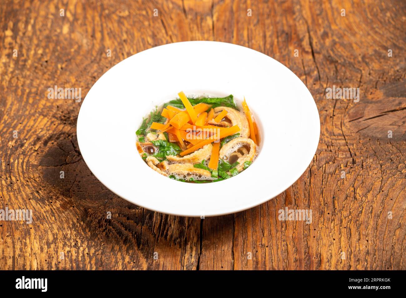 austrian pancake soup on wood Stock Photo