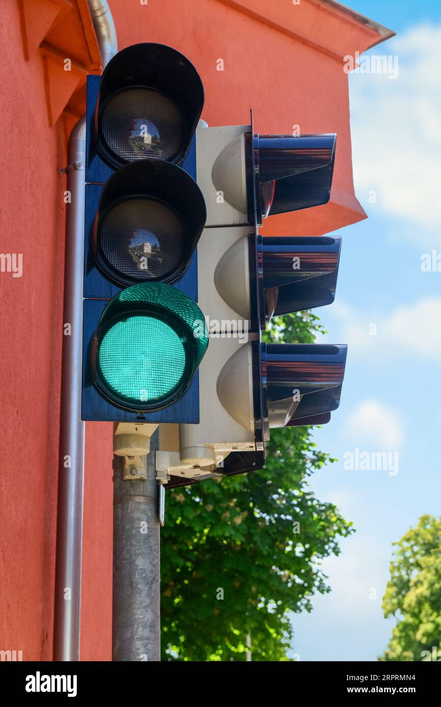View of green traffic light in city, closeup Stock Photo - Alamy