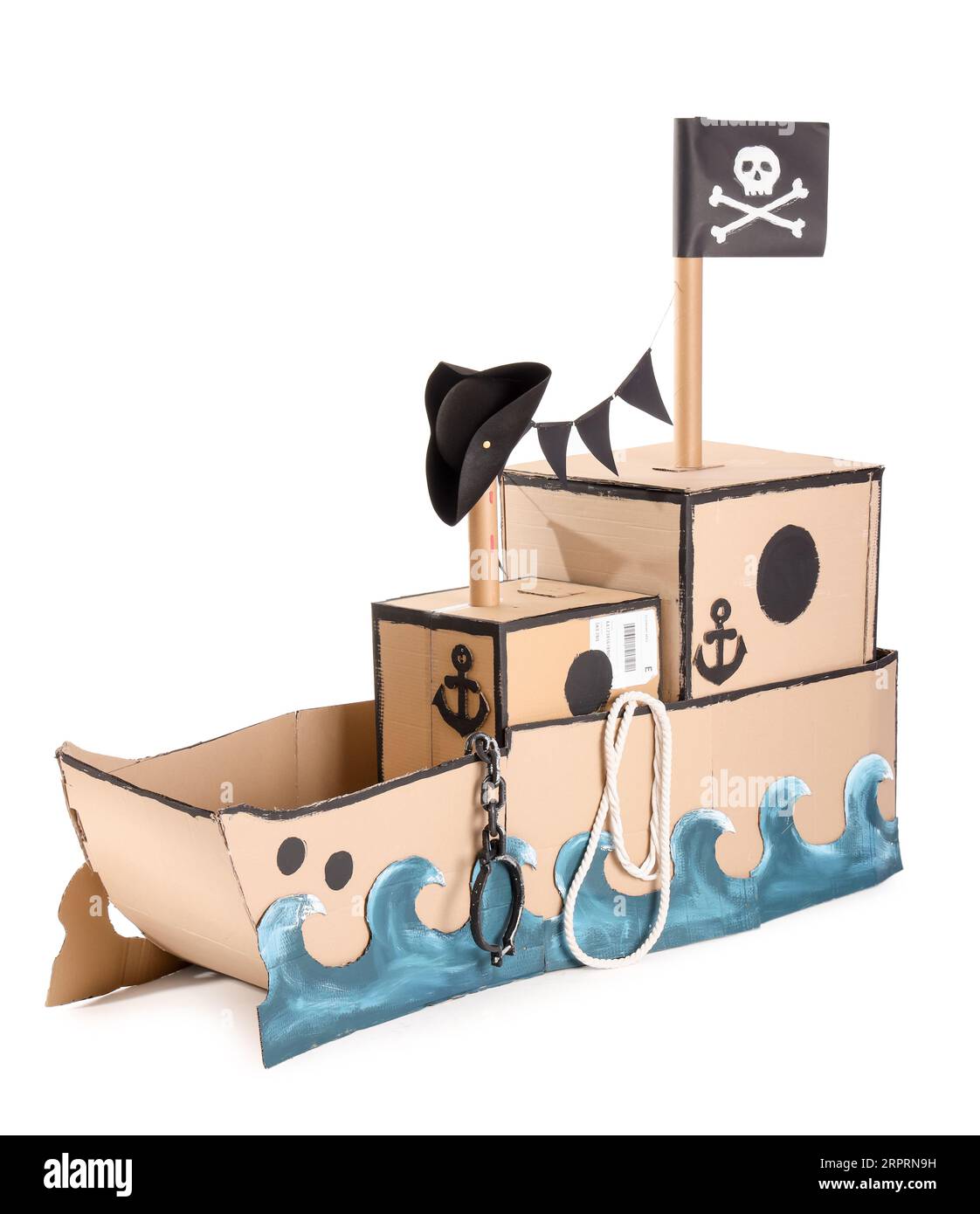 A meticulously crafted pirate ship made of cardboard, set against a clean white background. It showcases the potential for detail and creativity in cardboard construction.