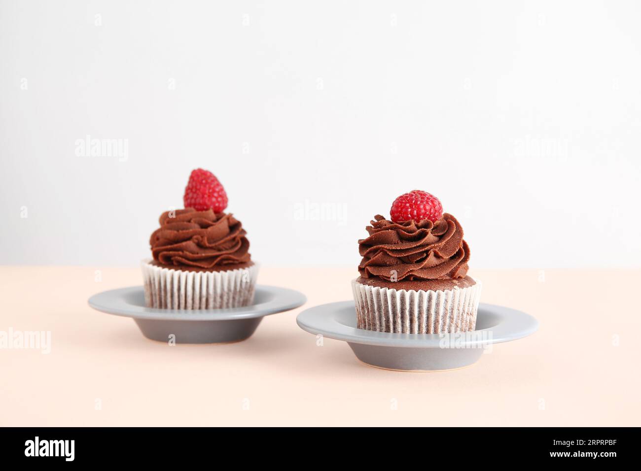 Chocolate muffins with decoration on the plate Stock Photo - Alamy