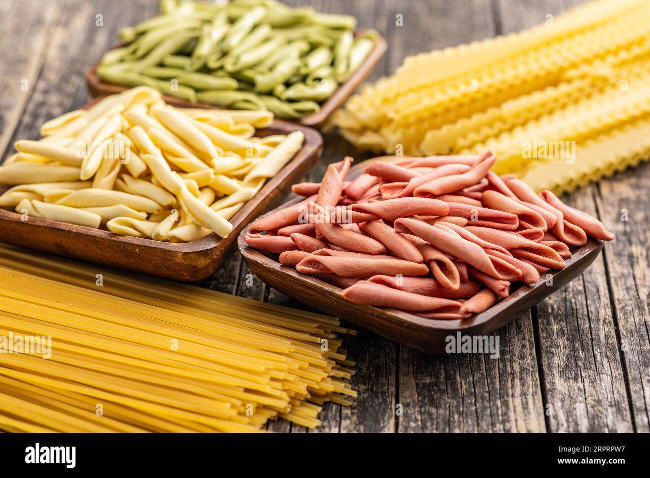 Fusilli pugliesi. Italian tricolor twisted pasta in the bowl Stock