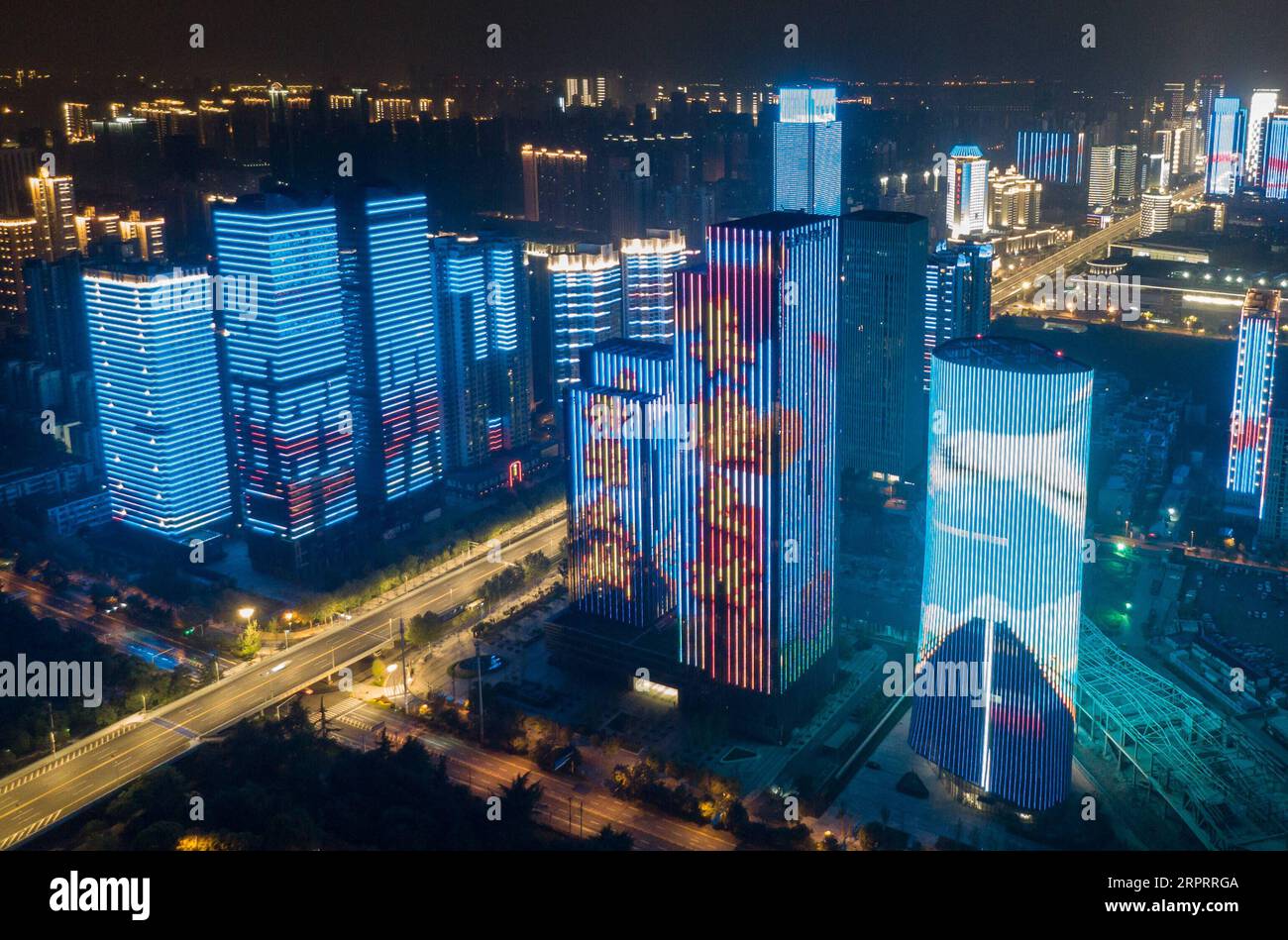 200408 -- WUHAN, April 8, 2020 -- Aerial photo taken on April 8, 2020 shows illuminated buildings in Wuhan, central China s Hubei Province. Wuhan, the megacity in central China, started lifting outbound travel restrictions from Wednesday after almost 11 weeks of lockdown to stem the spread of COVID-19.  CHINA-HUBEI-WUHAN-OUTBOUND TRAVEL RESTRICTIONS-LIFT CN ChengxMin PUBLICATIONxNOTxINxCHN Stock Photo