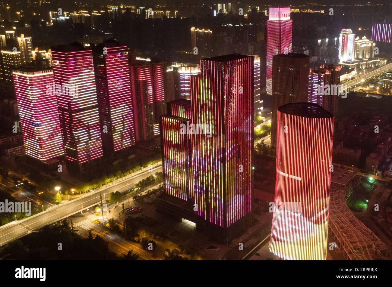 200408 -- WUHAN, April 8, 2020 -- Aerial photo taken on April 8, 2020 shows illuminated buildings in Wuhan, central China s Hubei Province. Wuhan, the megacity in central China, started lifting outbound travel restrictions from Wednesday after almost 11 weeks of lockdown to stem the spread of COVID-19.  CHINA-HUBEI-WUHAN-OUTBOUND TRAVEL RESTRICTIONS-LIFT CN ChengxMin PUBLICATIONxNOTxINxCHN Stock Photo