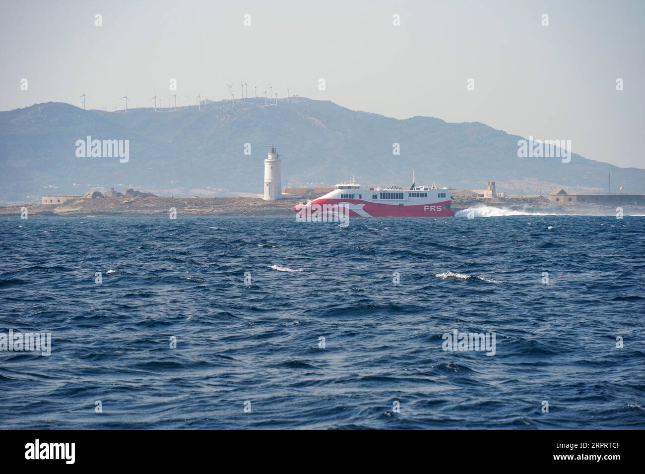 Tarifa Jet, fast catamaran ferry, leaving Port of Tarifa, Costa de la luz, Spain. Stock Photo