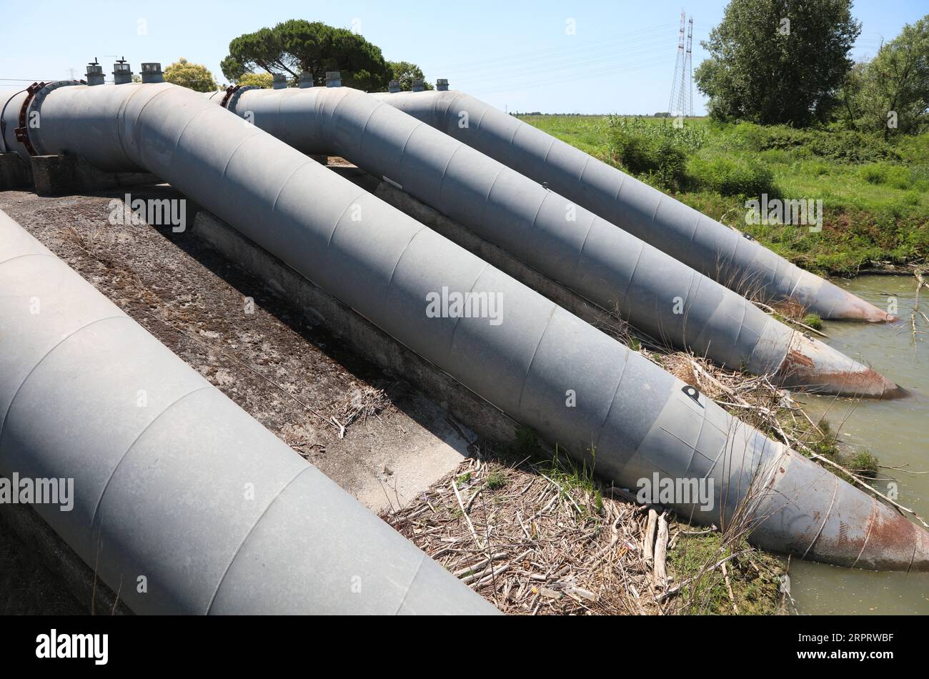 pipes of the powerful dewatering pumps for the reclamation of marshy