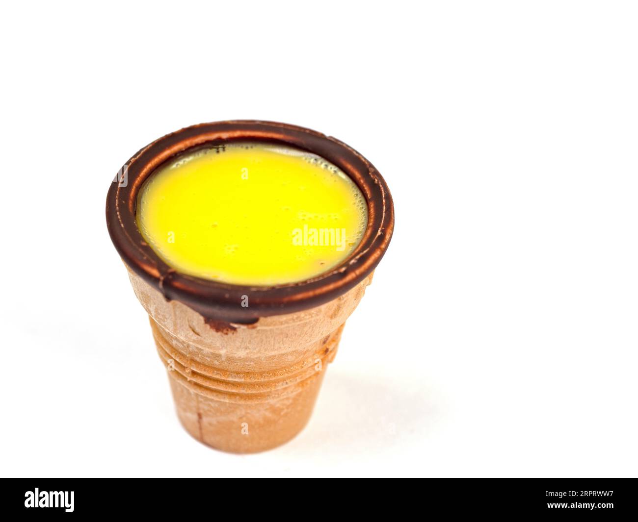 Eggnog in a waffle cup against a white background Stock Photo