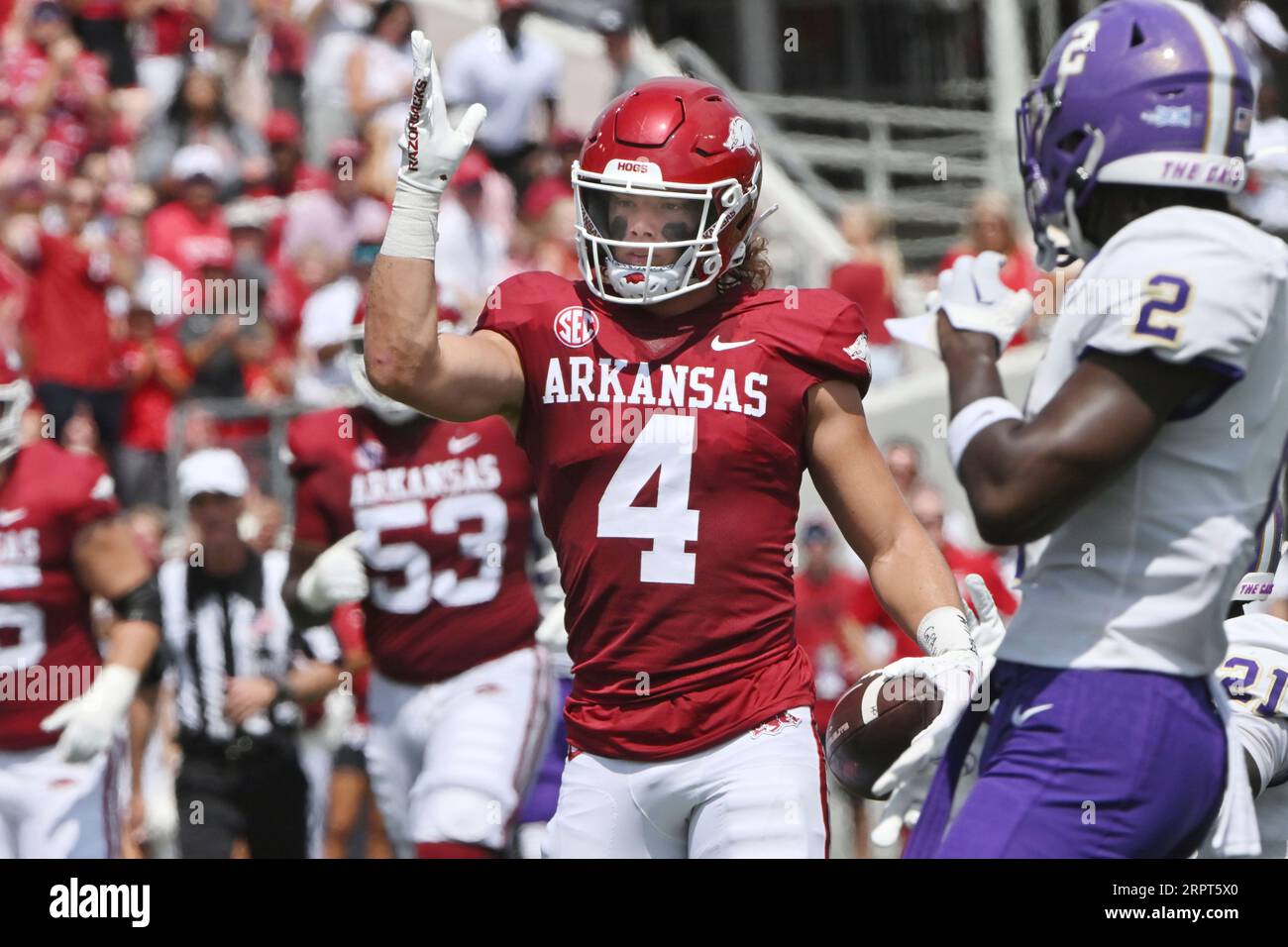 Arkansas wide receiver Isaac TeSlaa (4) reacts after making a first