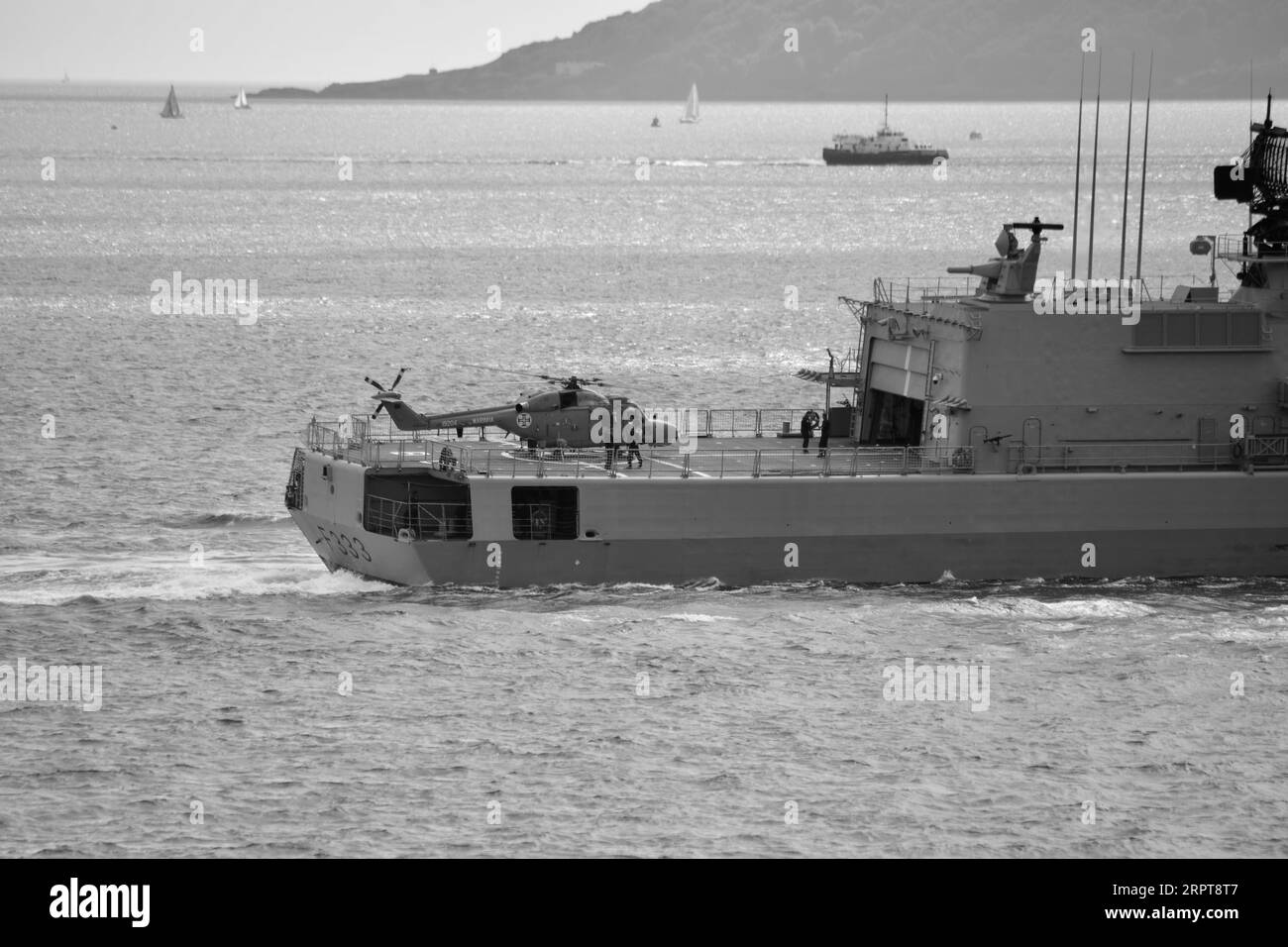 Plymouth, Devon, England UK: July 07 2022: Naval ships sail into the docks at Plymouth Sound. Stock Photo