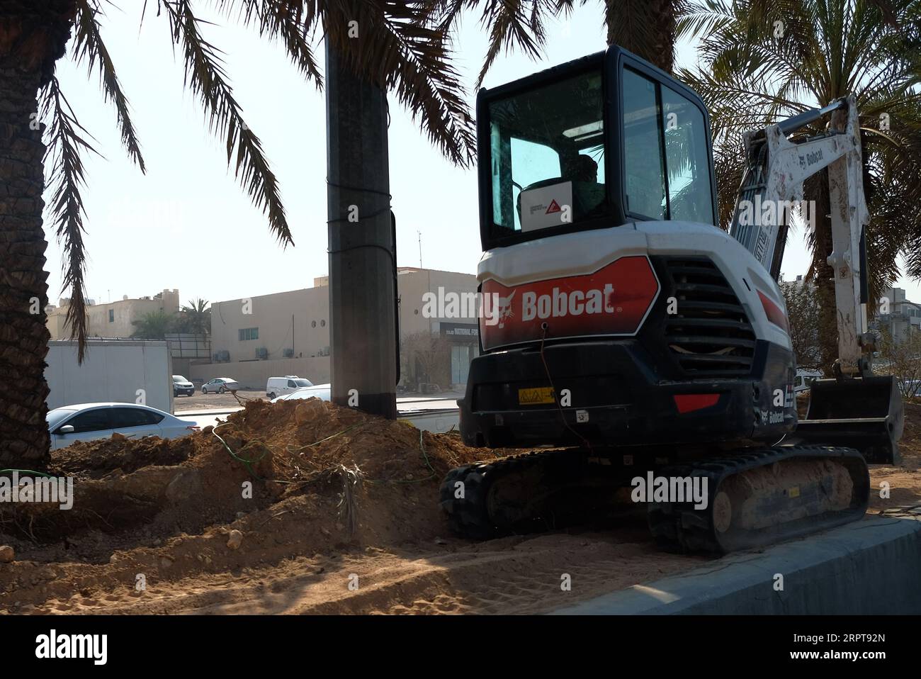 Skid-steer Loader Operate in Farming Stock Photo