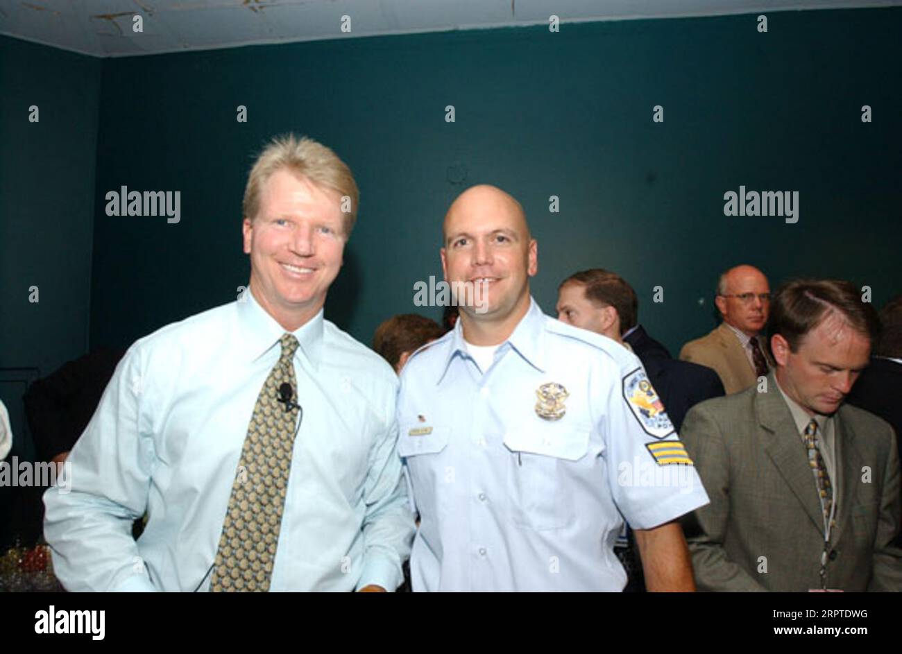 National Football League season kick-off events around Washington, D.C., including Kick-Off Weekend-Take Pride in America promotional gathering involving Secretary Gale Norton, other Department of Interior officials, and pro football celebrities, among them former New York Giants quarterback Phil Simms, left Stock Photo