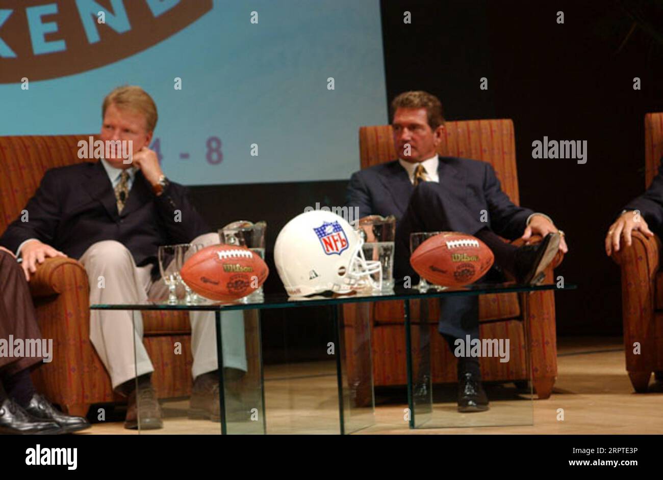 National Football League season kick-off events around Washington, D.C., including Kick-Off Weekend-Take Pride in America promotional gathering involving Secretary Gale Norton, other Department of Interior officials, and pro football celebrities, among them former quarterbacks Phil Simms, left, and Joe Theismann, right Stock Photo