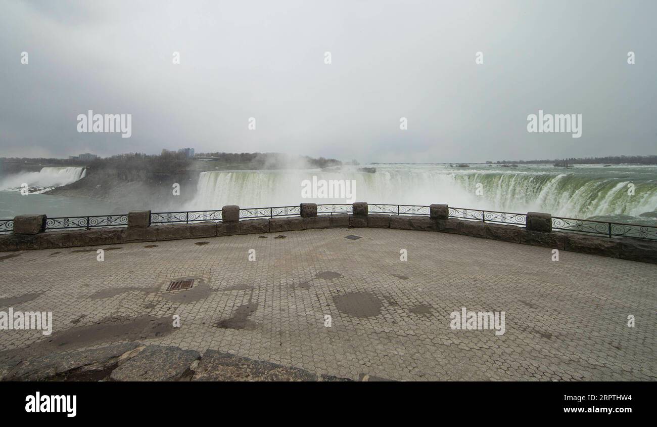 200415 -- NIAGARA FALLS, April 15, 2020 -- Niagara Falls with no visitors is seen from the Canadian side in Niagara Falls, Ontario, Canada, on April 15, 2020. Canadian Prime Minister Justin Trudeau announced Wednesday expanded eligibility rules for the Canada Emergency Response Benefit CERB so that part-time and seasonal workers can claim the CERB. As of Wednesday afternoon, there were 28,206 confirmed COVID-19 cases and 1,007 deaths across the country. Photo by /Xinhua CANADA-ONTARIO-NIAGARA FALLS-COVID-19-ECONOMY ZouxZheng PUBLICATIONxNOTxINxCHN Stock Photo